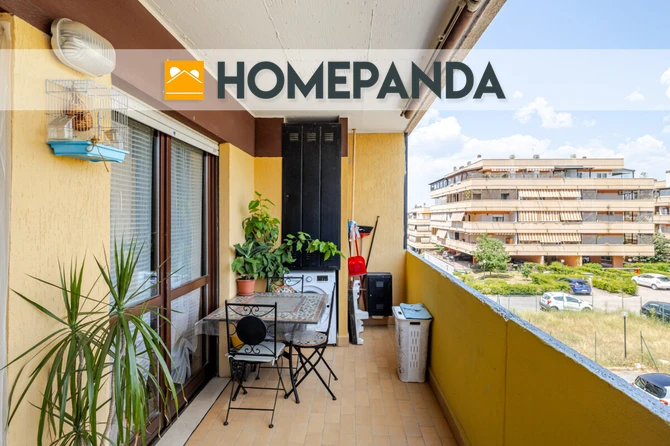 Appartamento con posto auto scoperto e balcone