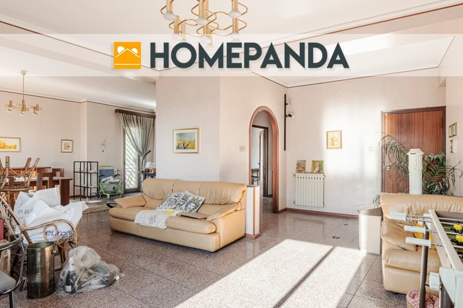 Ampio appartamento con giardino privato e garage