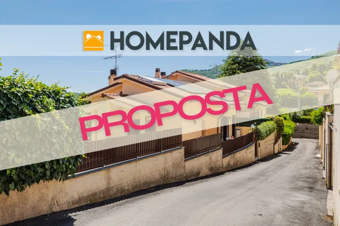 Villetta a schiera ristrutturata con ampio giardino e box