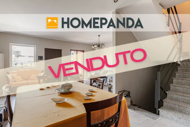 Villa a schiera con giardino e garage 